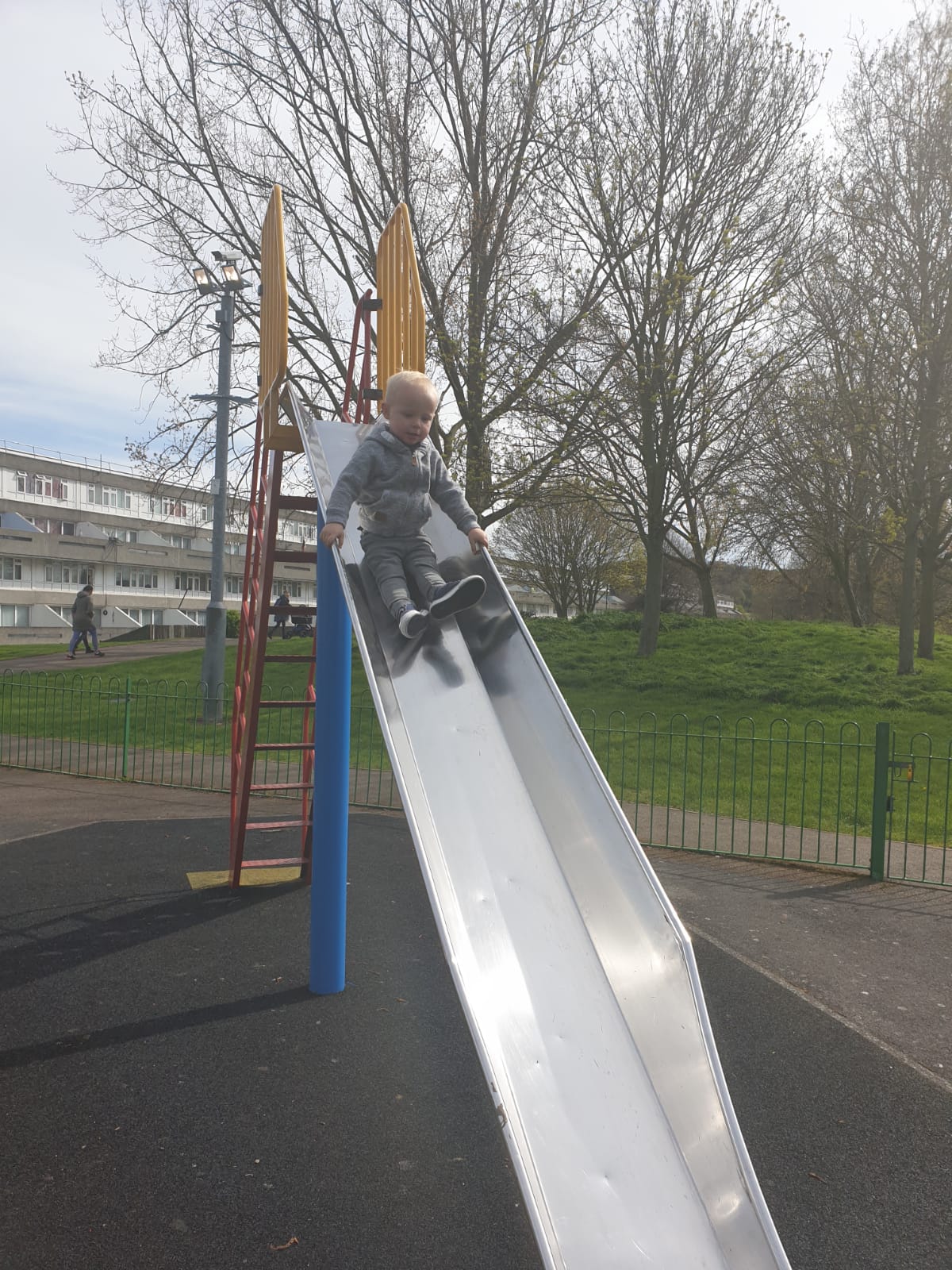 Child playing on a slide
