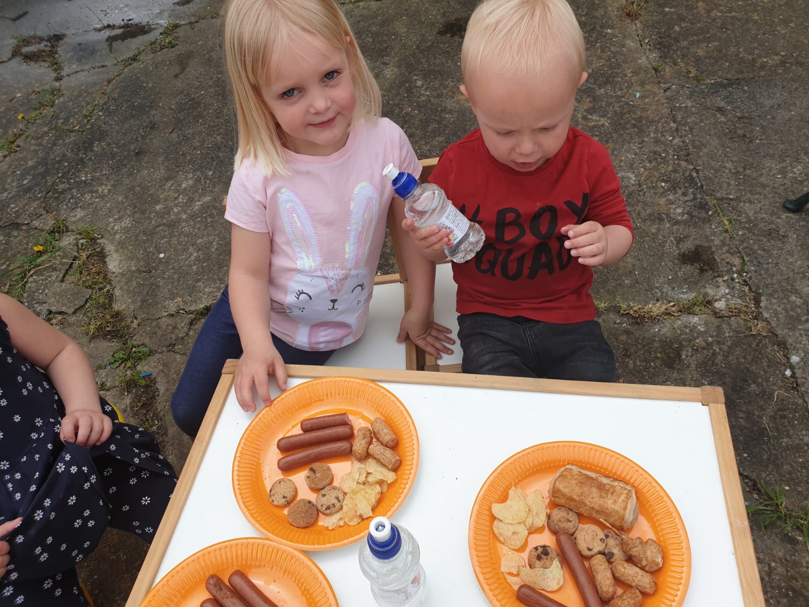 Children eating food outside