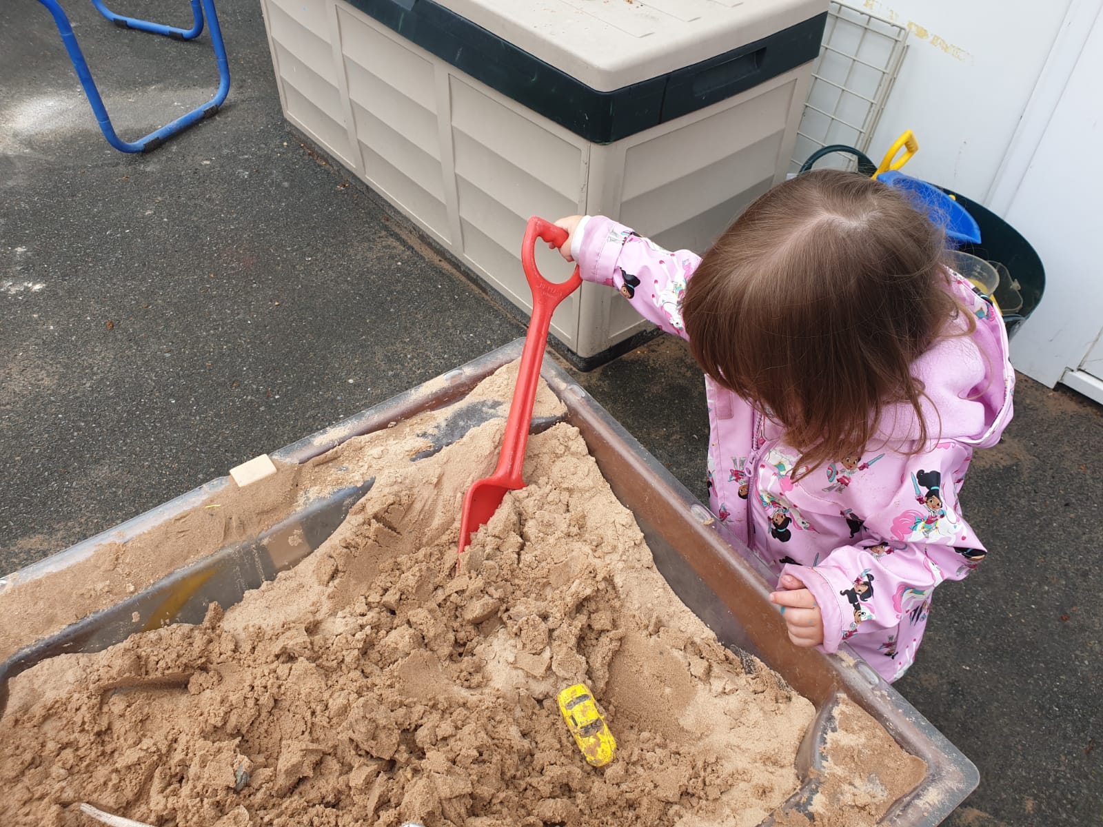 Child playing in sand