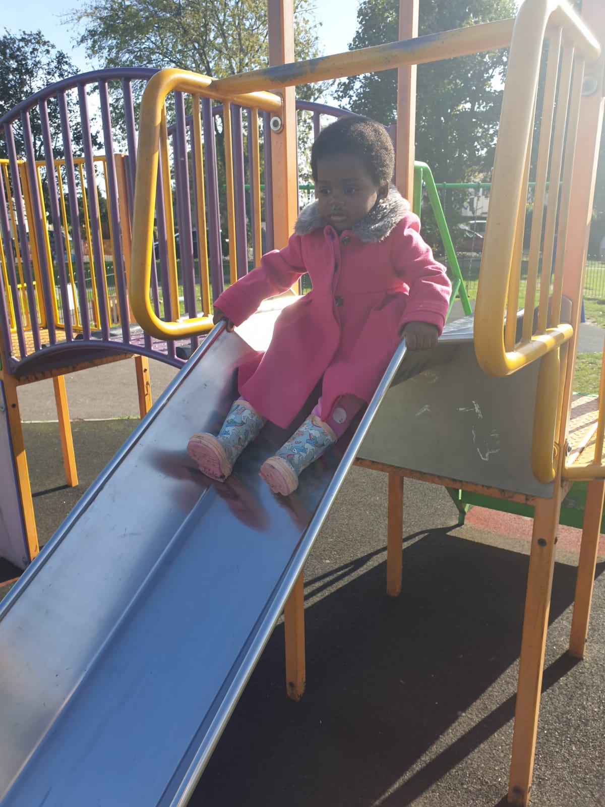 Child playing on slide